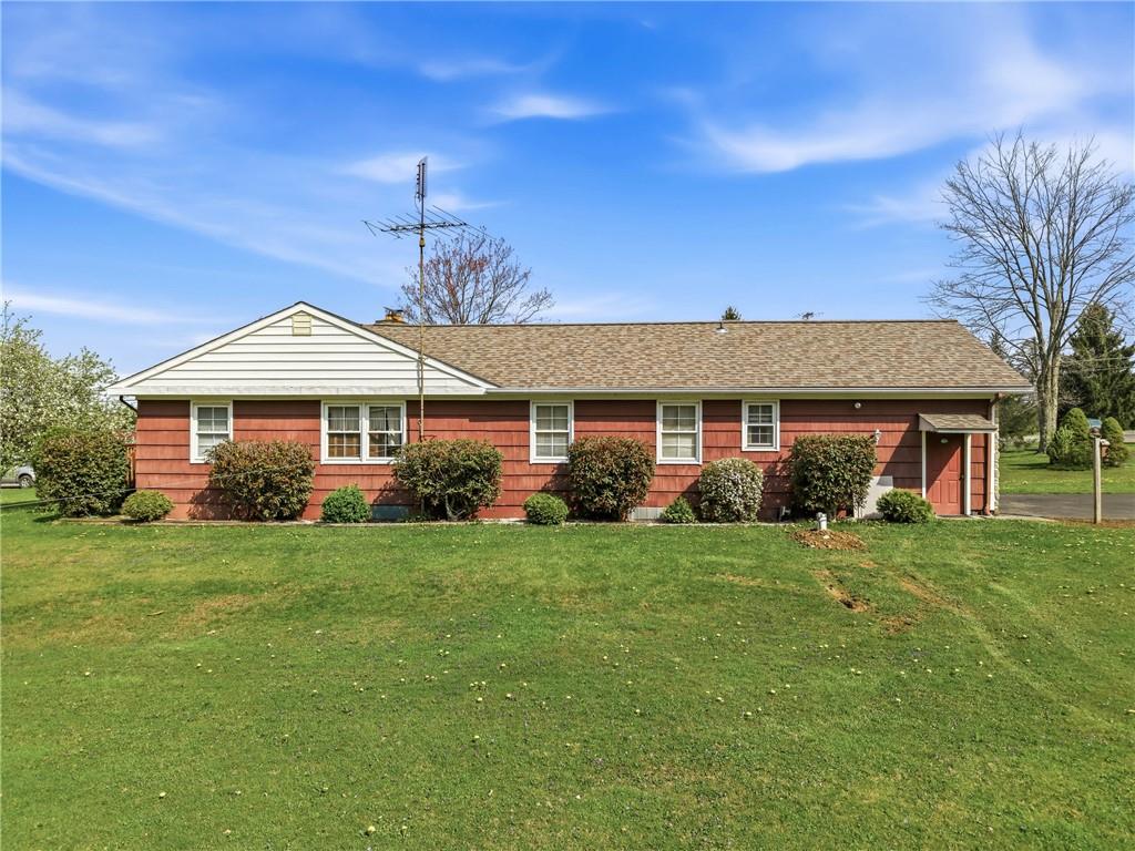 123 Hadley Road Greenville, PA 16125 - Photo 5 of 49 a front view of a house with a garden