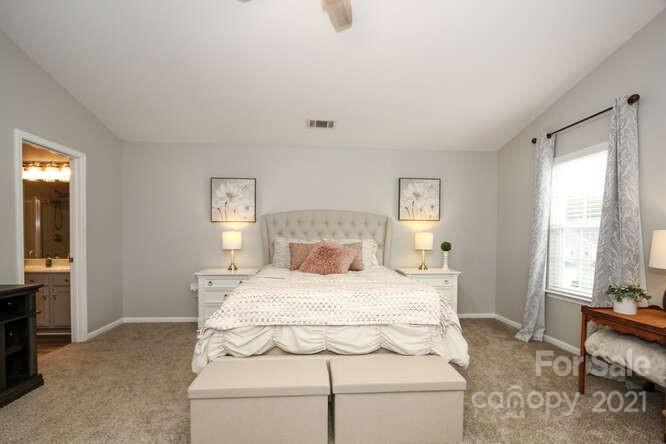 1431 River Run Road Lowell, NC 28098 - Photo 16 of 26 a bedroom with a bed and window