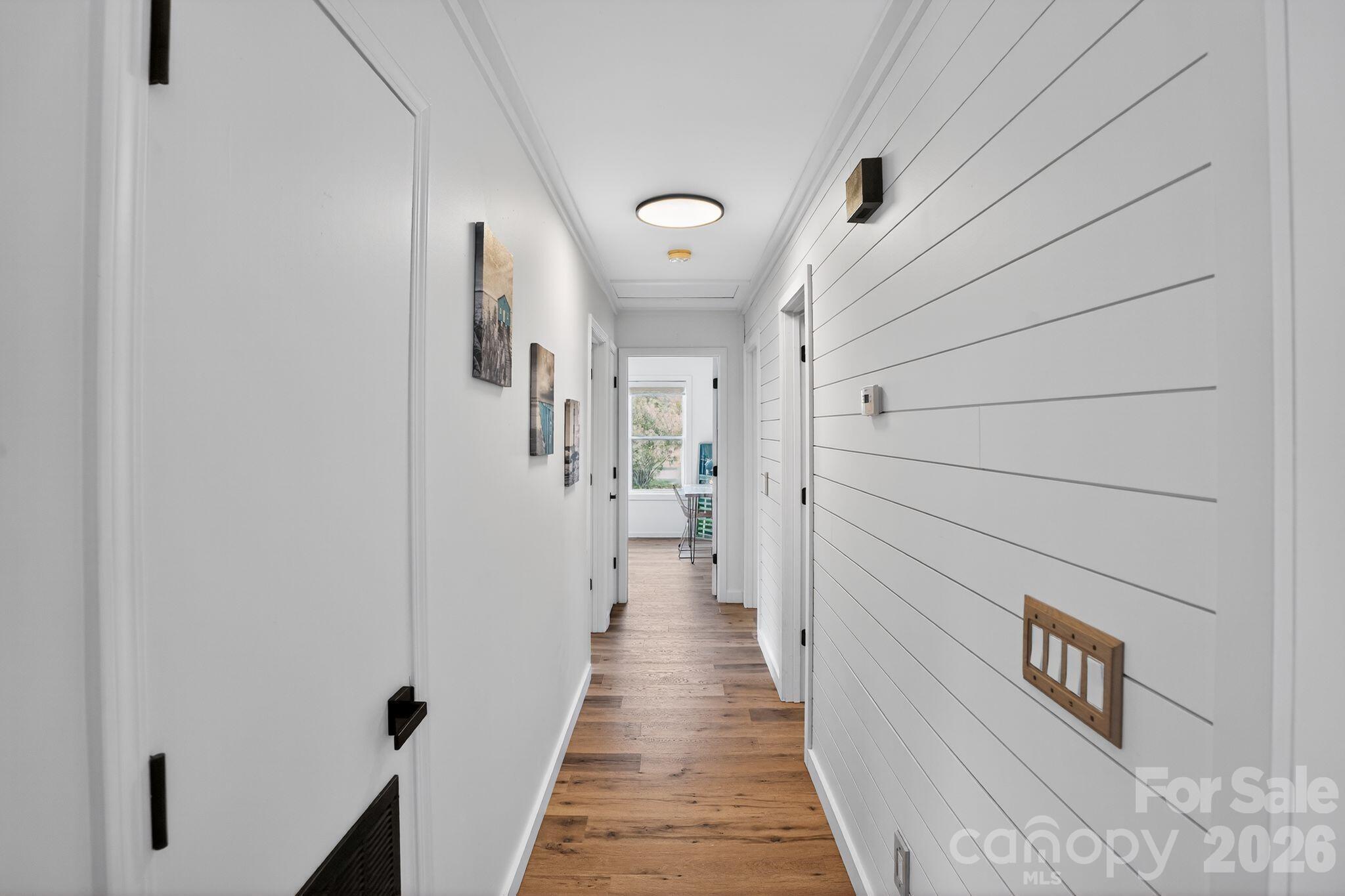 1724 Camp Shelor Road Manning, SC 29102 - Photo 22 of 48 a view of a hallway with wooden floor and staircase