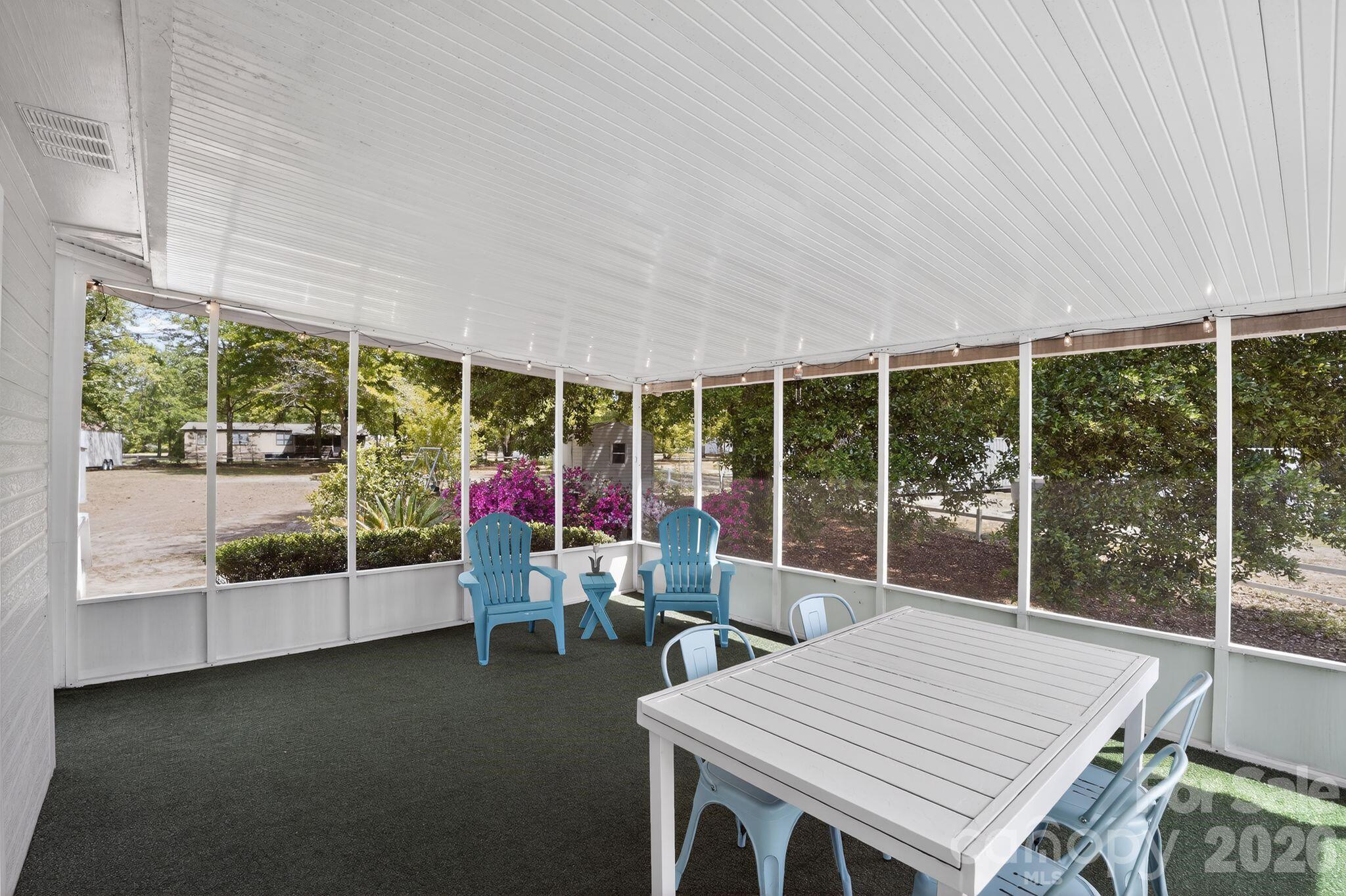 1724 Camp Shelor Road Manning, SC 29102 - Photo 26 of 48 a view of a patio with a table and chairs