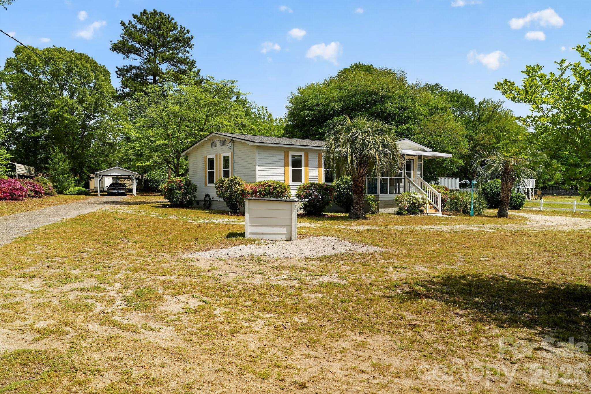 1724 Camp Shelor Road Manning, SC 29102 - Photo 30 of 48 a view of a house with a yard