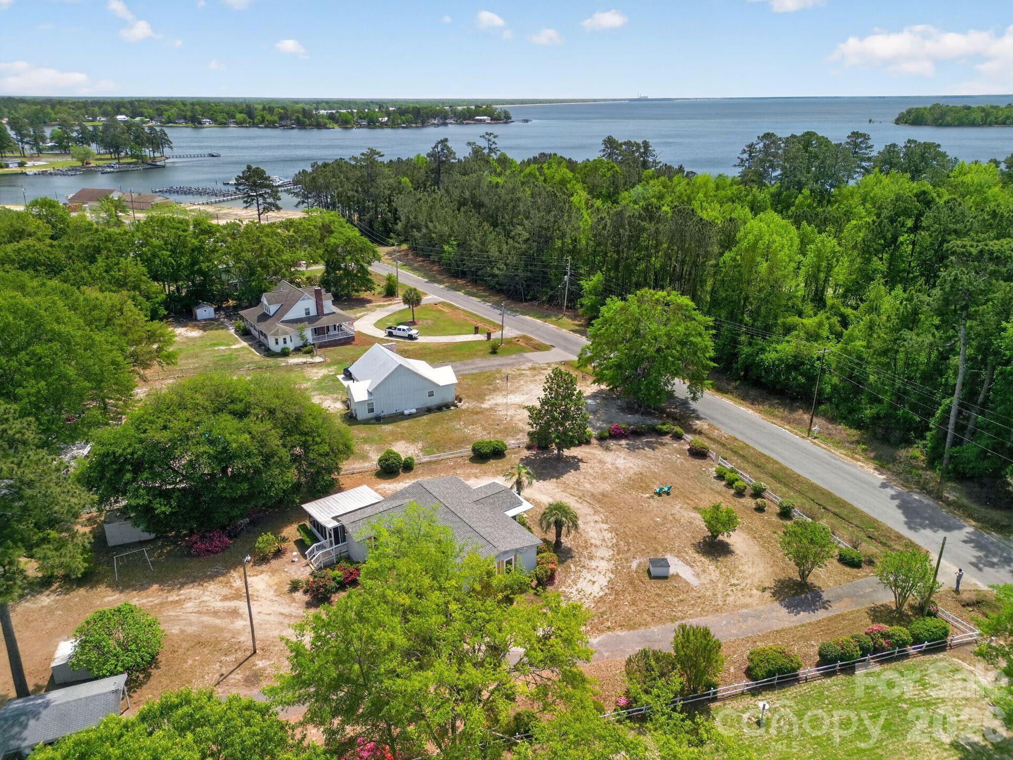 1724 Camp Shelor Road Manning, SC 29102 - Photo 46 of 48 an aerial view of residential houses with outdoor space and river