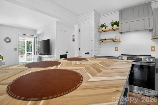 a view of a porch and garden