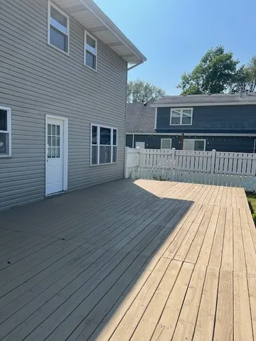a view of balcony with deck
