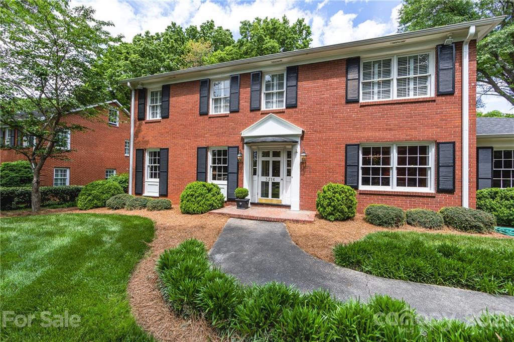 3216 Ferncliff Road Charlotte, NC 28211 - Photo 4 of 47 a front view of a house with yard and green space