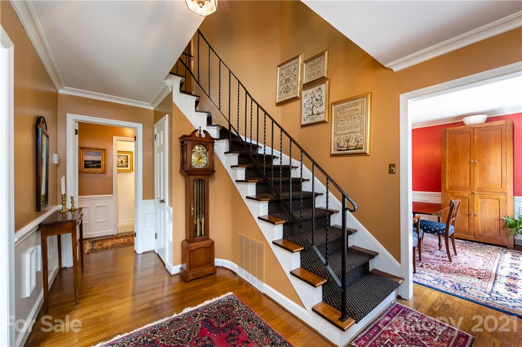 3216 Ferncliff Road Charlotte, NC 28211 - Photo 7 of 47 a view of entryway and hall with wooden floor