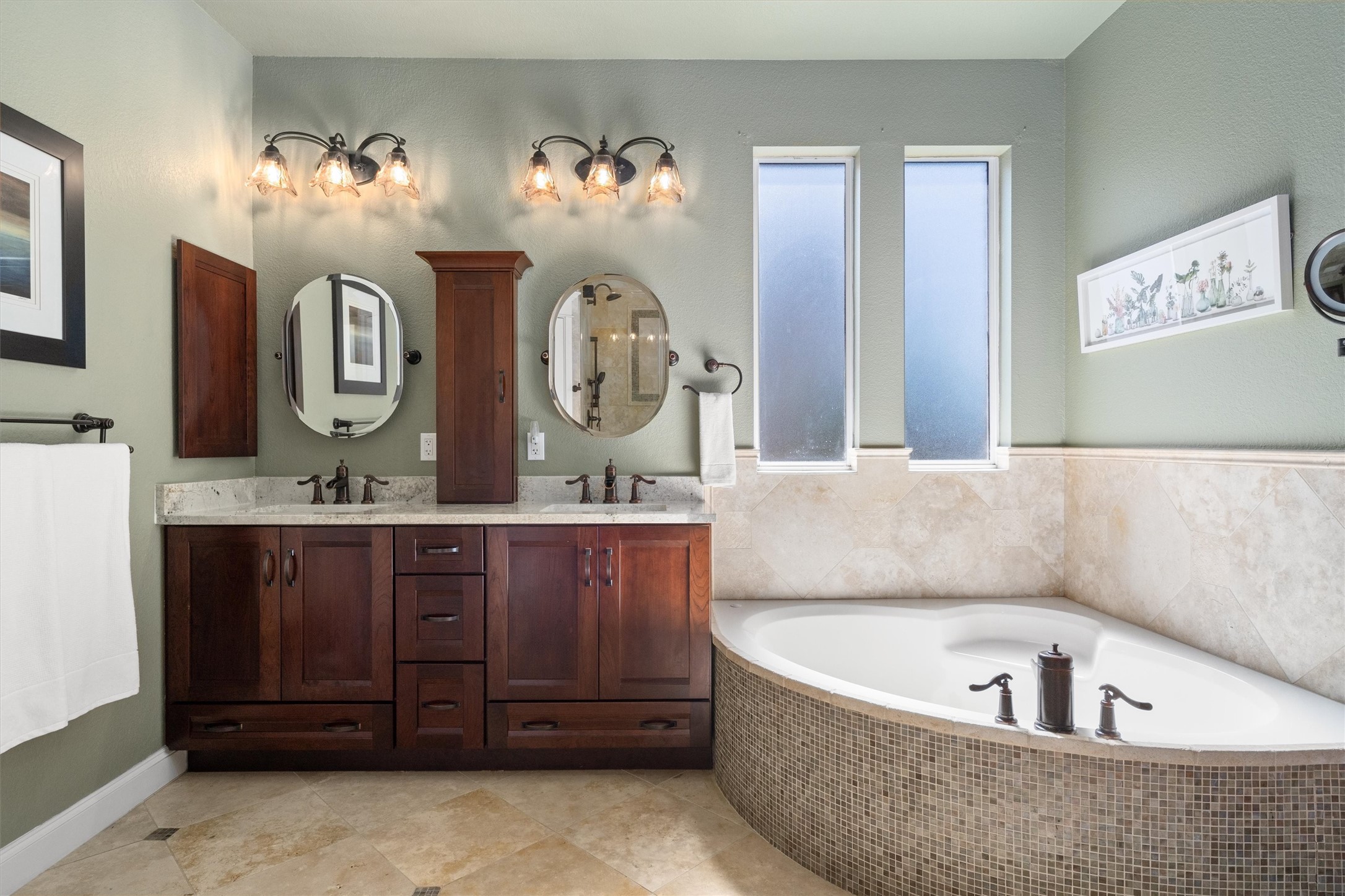 3105 Castellano Way Cedar Park, TX 78613 - Photo 23 of 40 Spa-inspired primary bathroom featuring a dual vanity with ample storage, and a relaxing soaking tub.