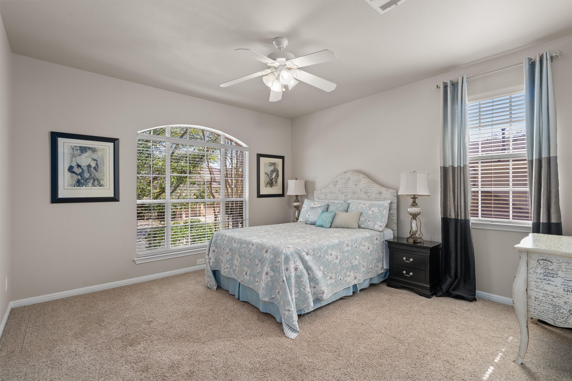 3105 Castellano Way Cedar Park, TX 78613 - Photo 27 of 40 Upper level secondary bedroom featuring lots of space and natural light with direct access to a Jack and Jill bathroom.