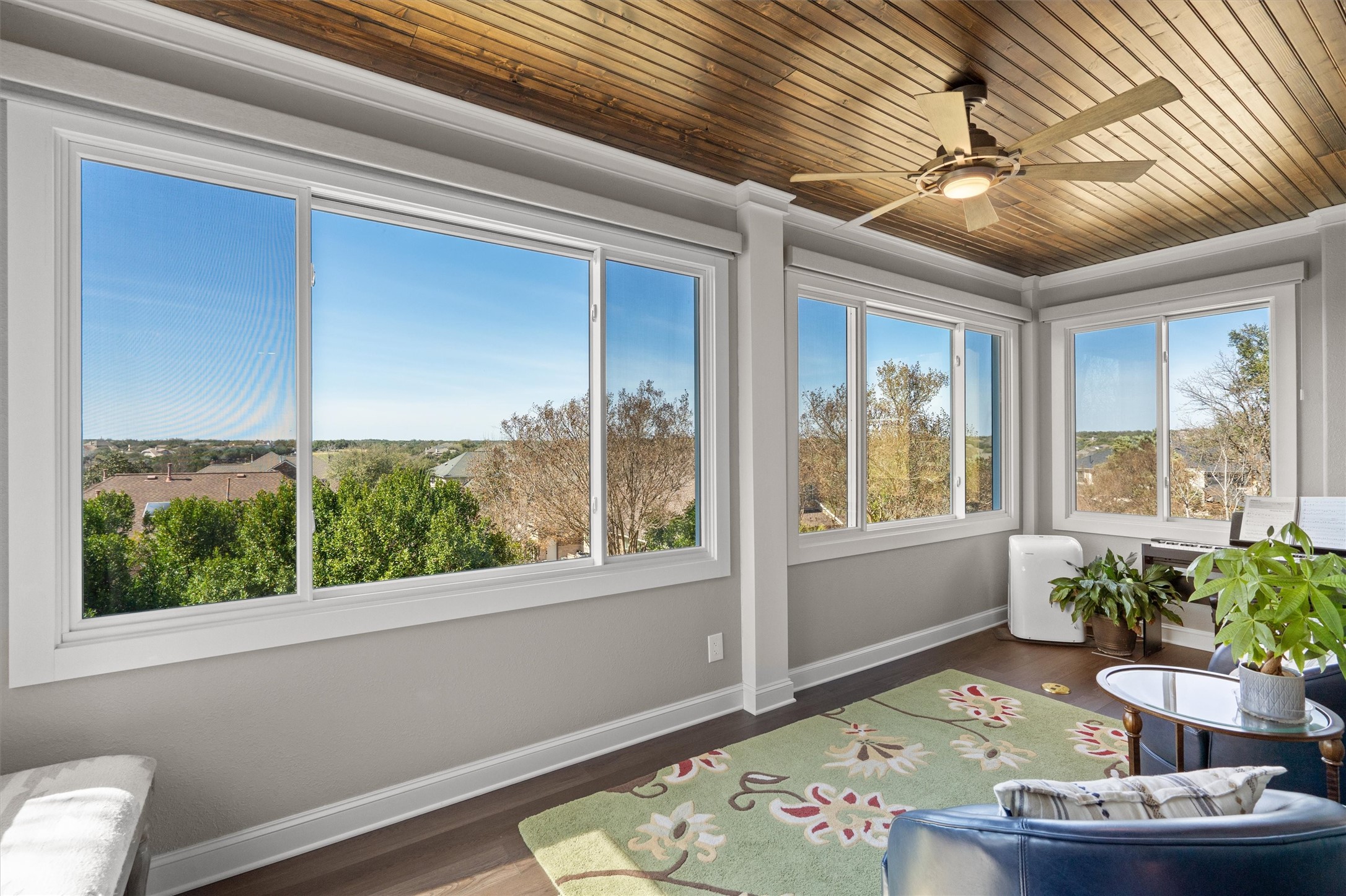 3105 Castellano Way Cedar Park, TX 78613 - Photo 31 of 40 Enclosed former balcony transformed into a light filled bonus space with expansive windows and scenic views, you can even see the twin creeks golf course! Easily heated or cooled with a portable unit-ideal as a second office, sitting room, or peaceful retreat to enjoy the outlook year-around.