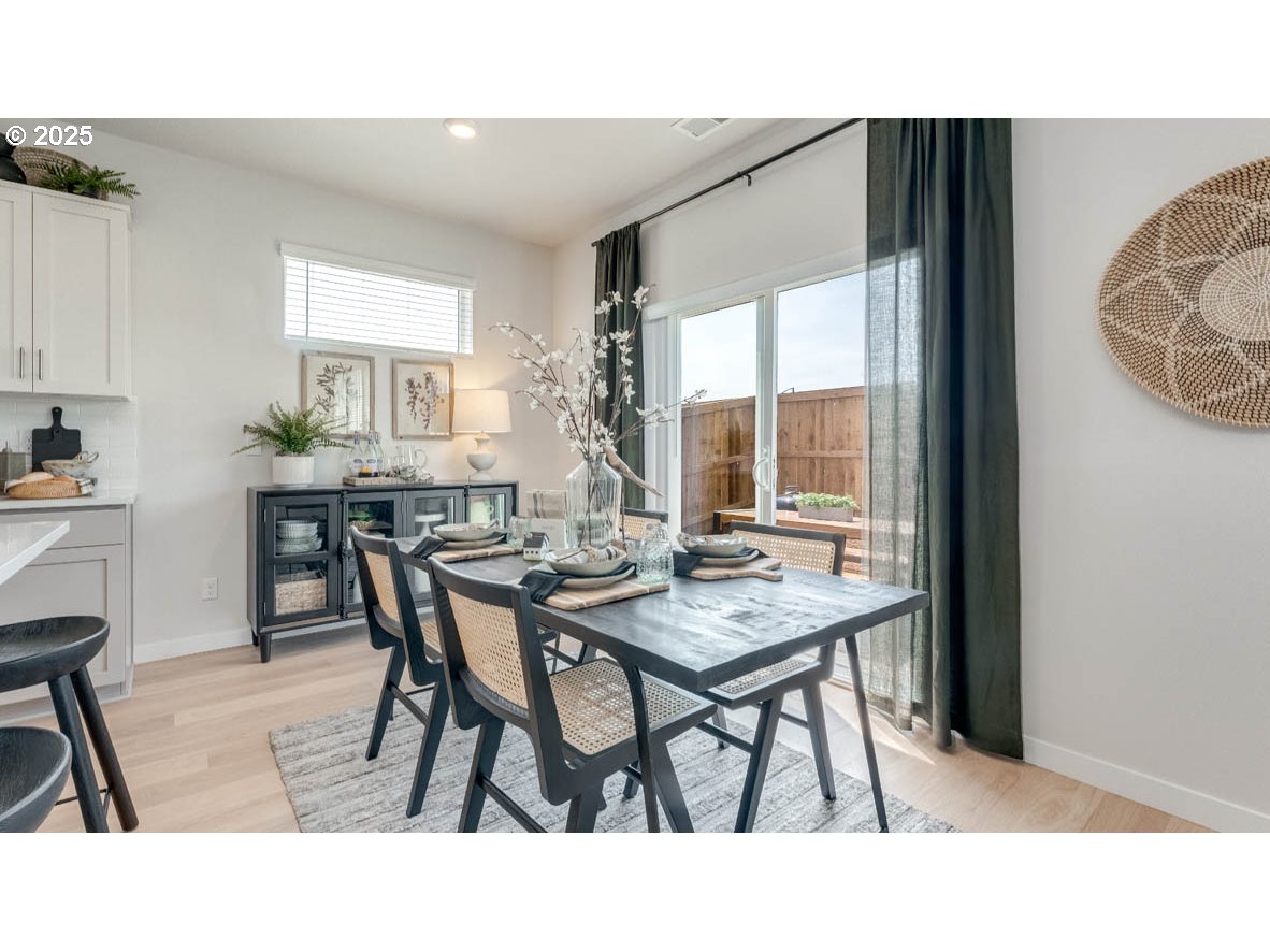 3609 Main Street Forest Grove, OR 97116 - Photo 11 of 29 a kitchen with a table and chairs in it