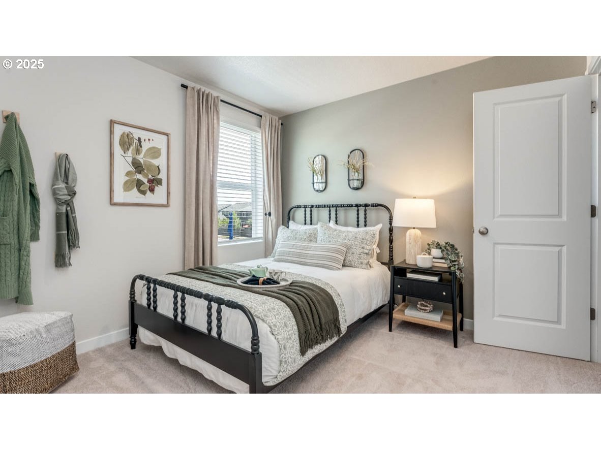 3609 Main Street Forest Grove, OR 97116 - Photo 13 of 29 a bedroom with a bed lamp and a window