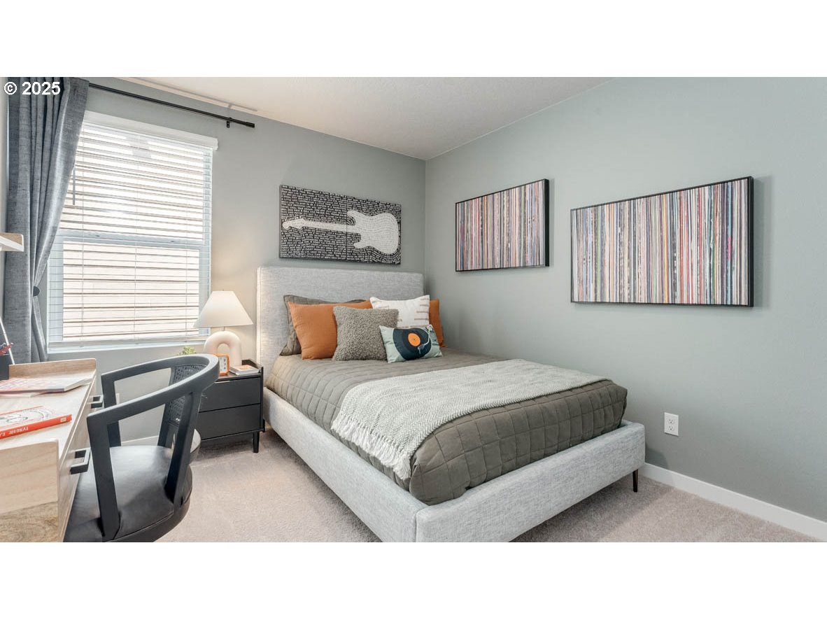 3609 Main Street Forest Grove, OR 97116 - Photo 16 of 29 a bed room with a bed and a night stand