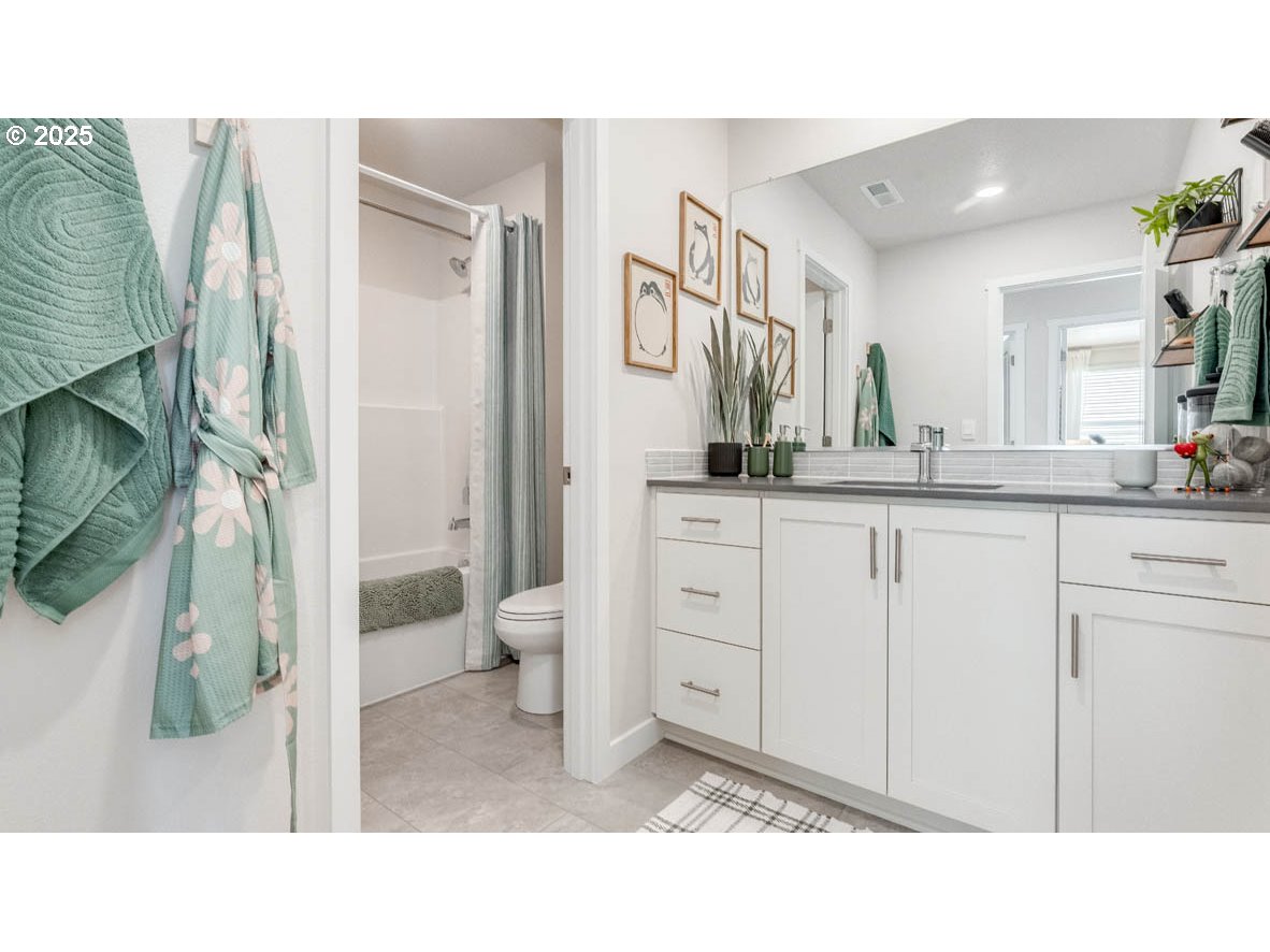 3609 Main Street Forest Grove, OR 97116 - Photo 18 of 29 a bathroom with a sink and a mirror