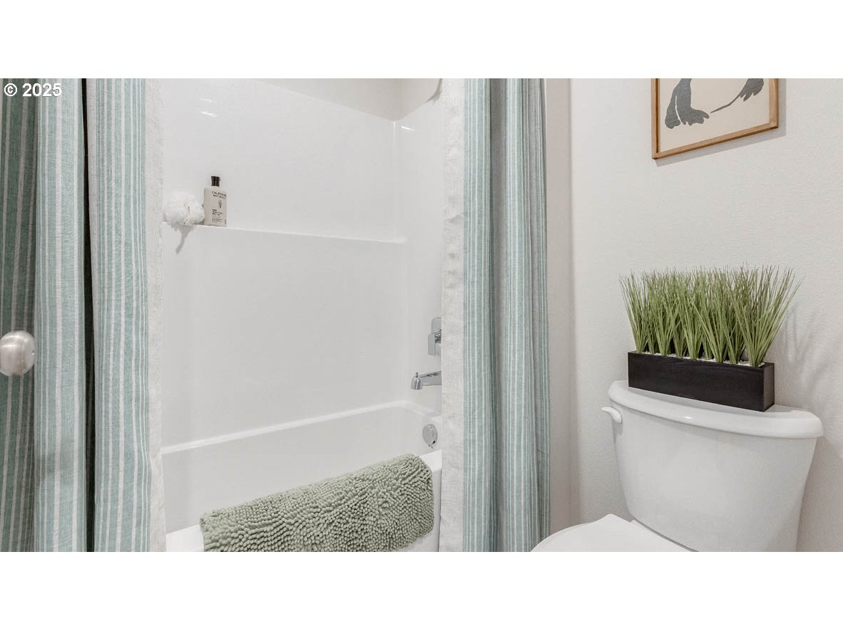 3609 Main Street Forest Grove, OR 97116 - Photo 19 of 29 a bathroom with a sink and a mirror