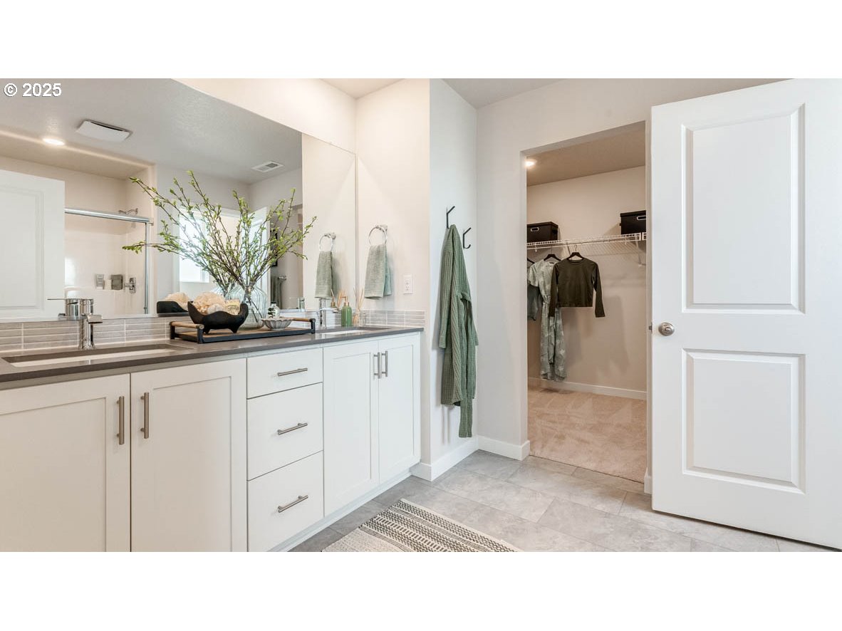 3609 Main Street Forest Grove, OR 97116 - Photo 23 of 29 a bathroom with a double vanity sink and a mirror