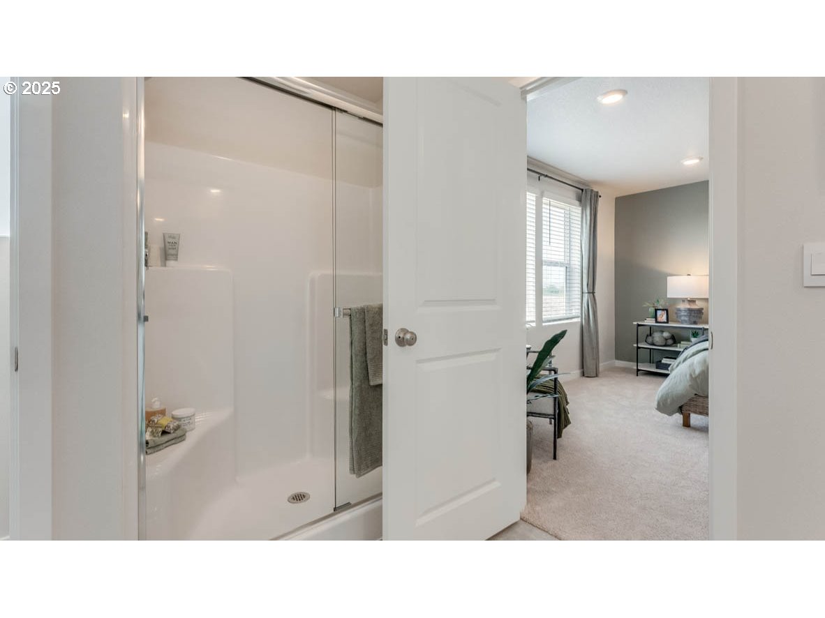 3609 Main Street Forest Grove, OR 97116 - Photo 24 of 29 a bathroom with a tub shower and a sink