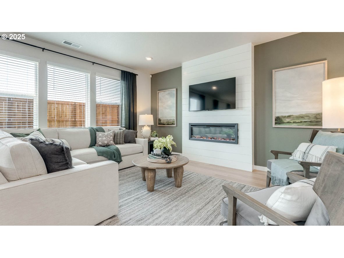 3609 Main Street Forest Grove, OR 97116 - Photo 4 of 29 a living room with furniture and a flat screen tv