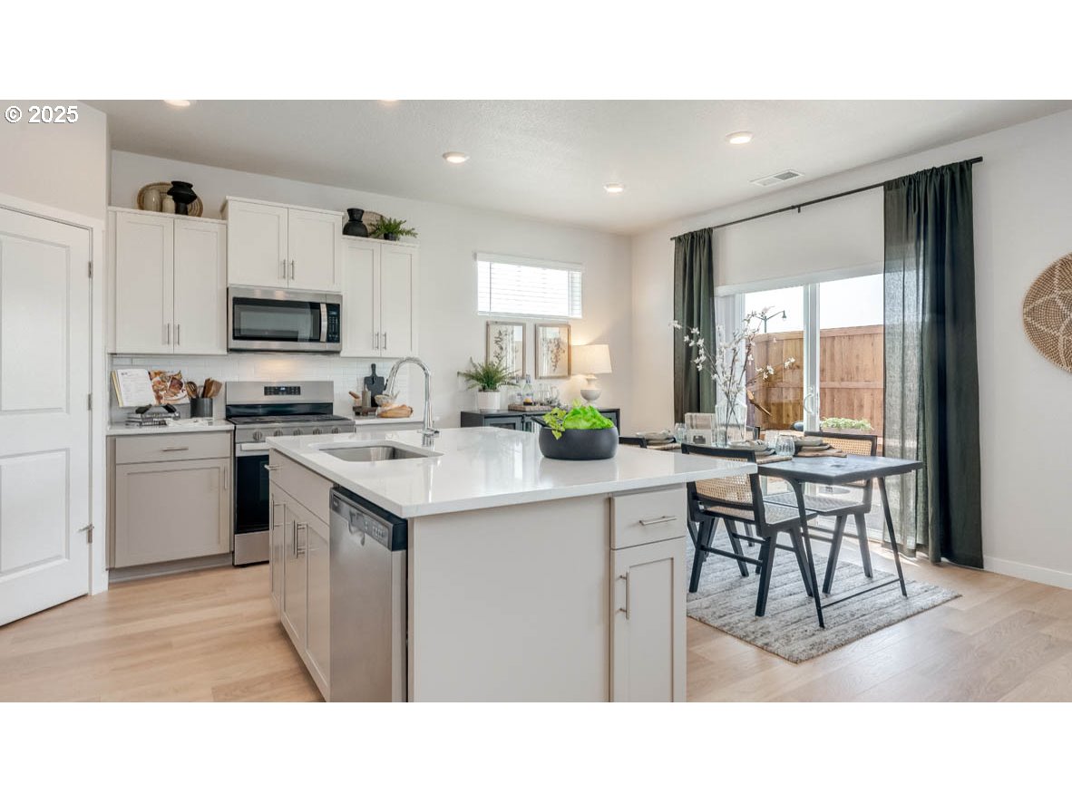 3609 Main Street Forest Grove, OR 97116 - Photo 7 of 29 a kitchen with sink and cabinets