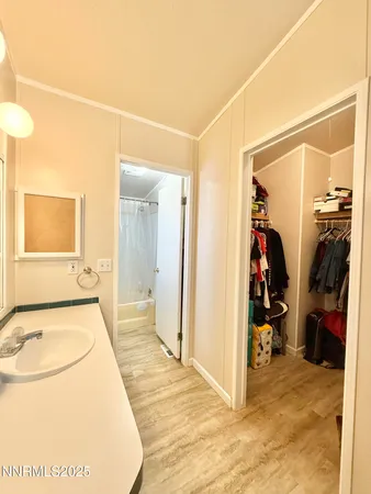 a view of a livingroom with furniture and storage