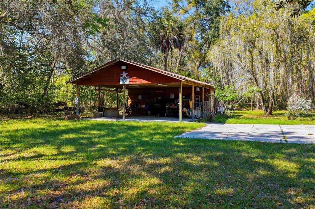 596 Highway 20 Palatka, FL 32177 - Photo 11 of 49 a view of a house with a yard