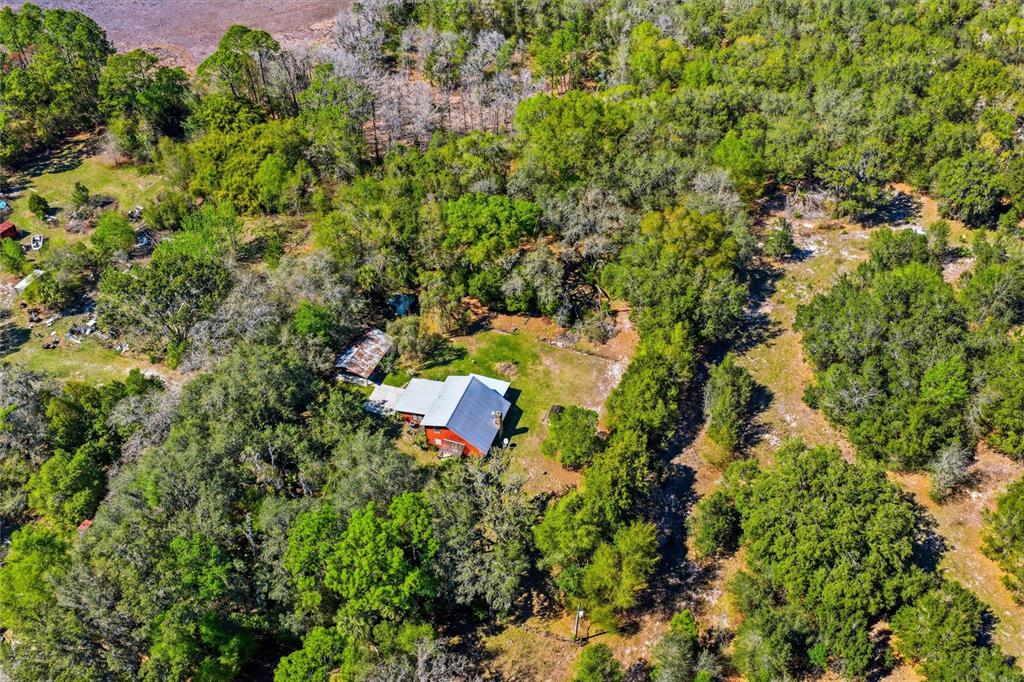 596 Highway 20 Palatka, FL 32177 - Photo 16 of 49 an aerial view of a house with a yard