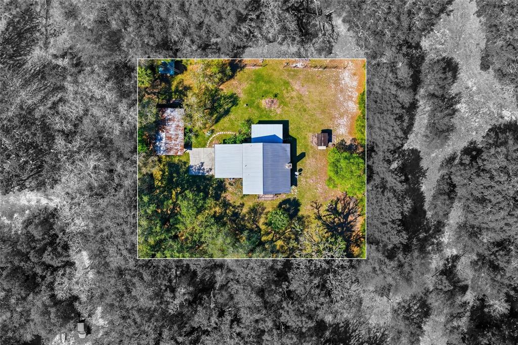 596 Highway 20 Palatka, FL 32177 - Photo 19 of 49 an aerial view of residential house with outdoor space and swimming pool