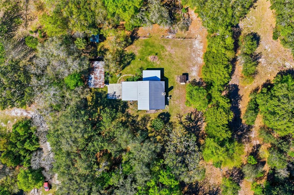 596 Highway 20 Palatka, FL 32177 - Photo 20 of 49 an aerial view of a house with a yard