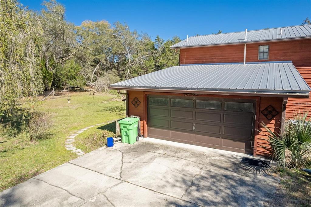 596 Highway 20 Palatka, FL 32177 - Photo 8 of 49 a front view of a house with a garage