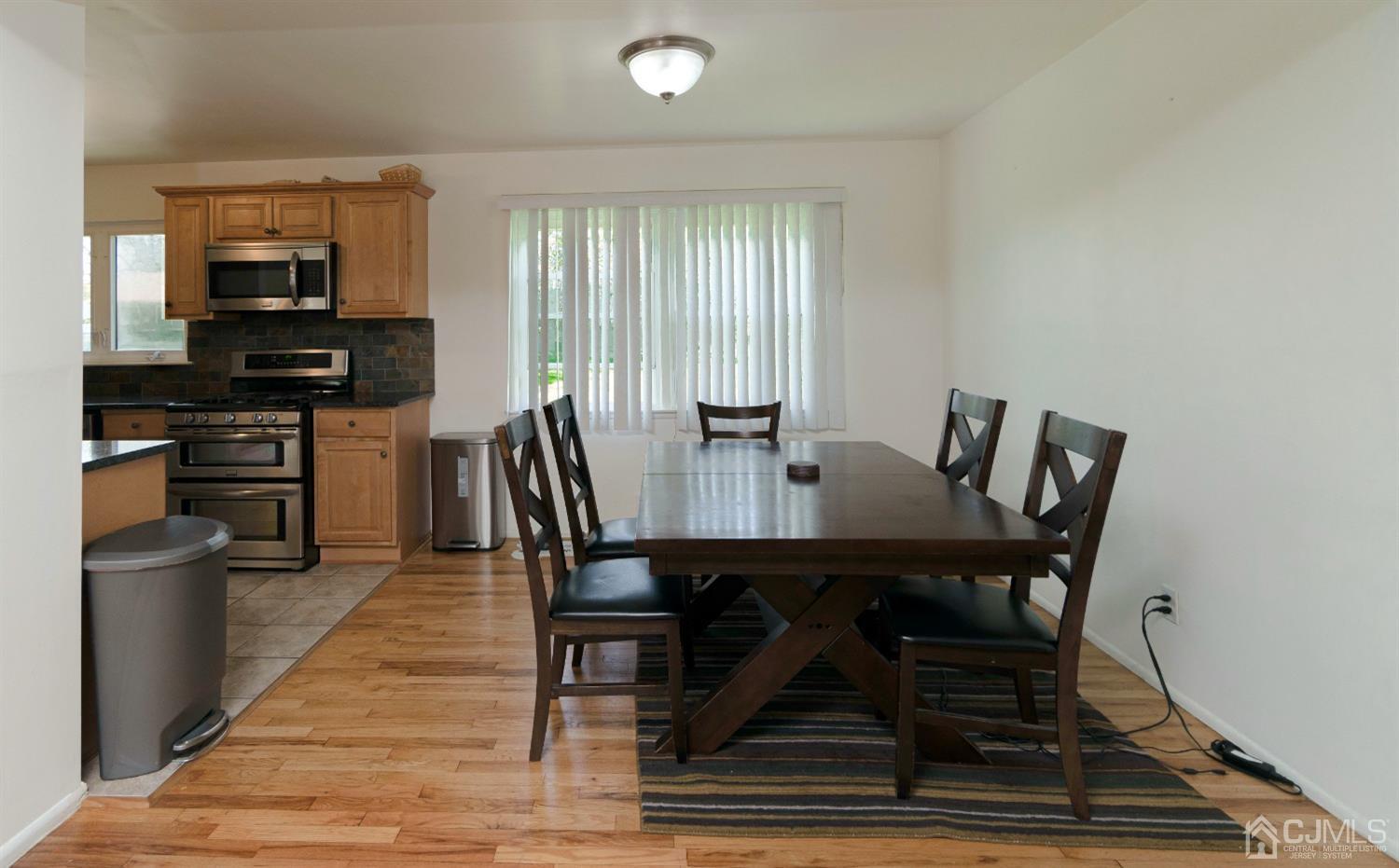 26 Phillips Road Edison, NJ 08817 - Photo 11 of 27 a view of a dining room with furniture
