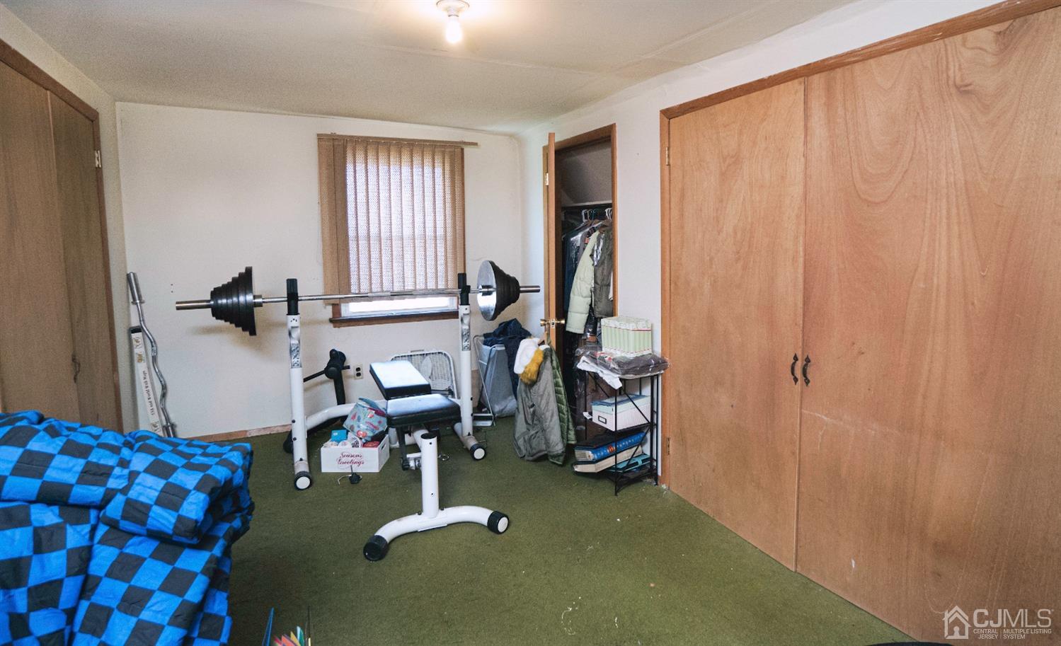 26 Phillips Road Edison, NJ 08817 - Photo 20 of 27 a view of a room with gym equipment