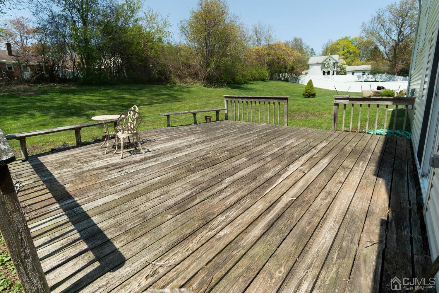 26 Phillips Road Edison, NJ 08817 - Photo 21 of 27 a view of a park with chairs on a deck