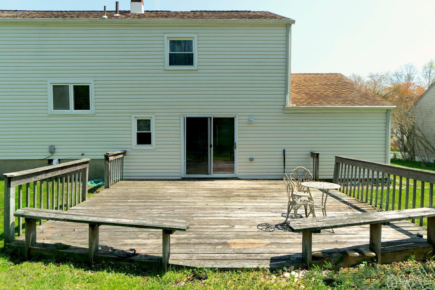 26 Phillips Road Edison, NJ 08817 - Photo 22 of 27 a view of a house with wooden deck