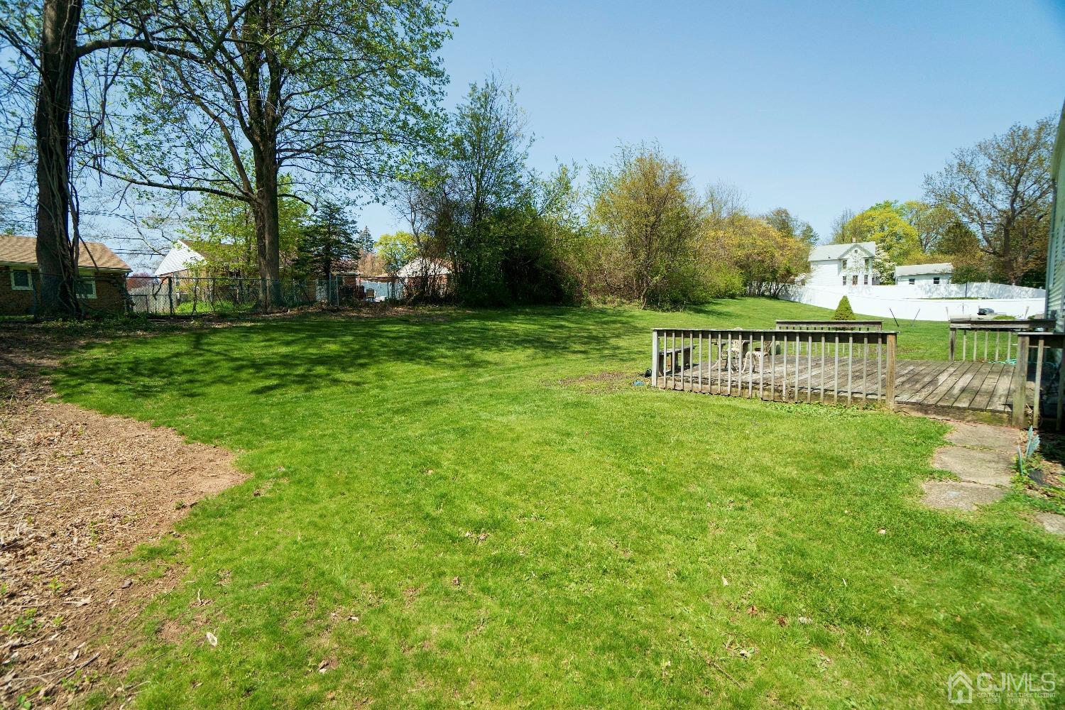 26 Phillips Road Edison, NJ 08817 - Photo 24 of 27 a view of a park with bench and trees