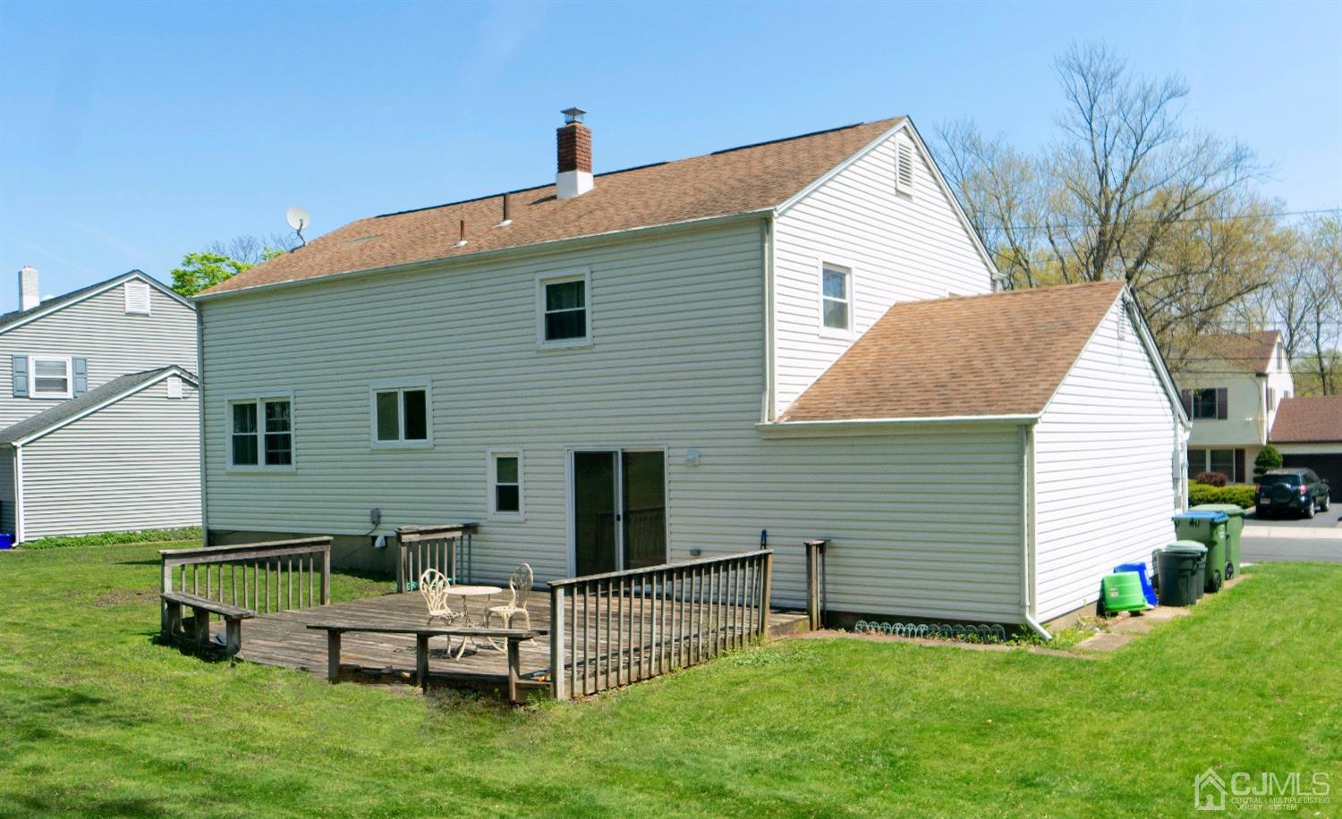 26 Phillips Road Edison, NJ 08817 - Photo 25 of 27 a view of backyard with a garden and deck