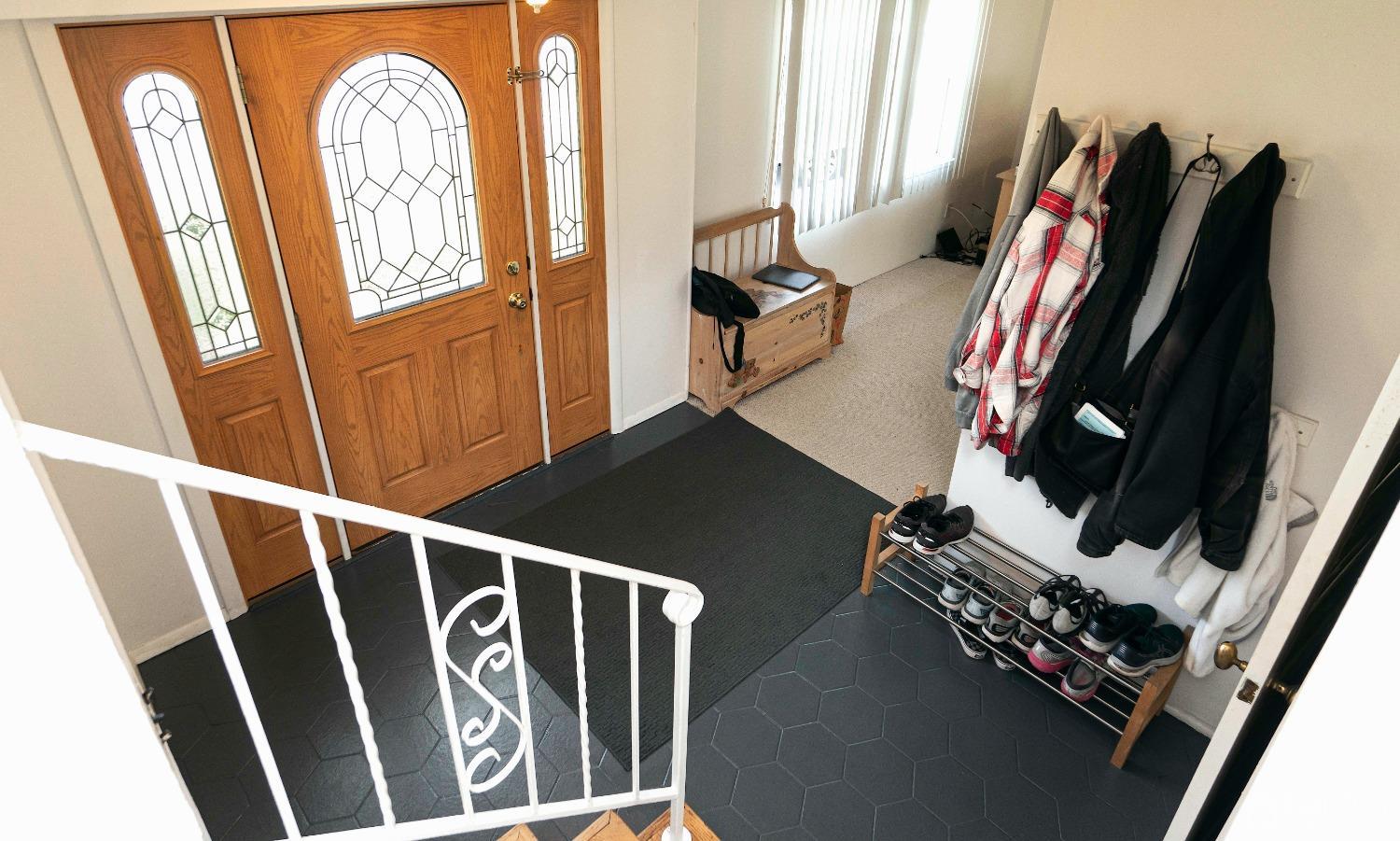 26 Phillips Road Edison, NJ 08817 - Photo 7 of 27 a view of walk in closet with clothes and shoes