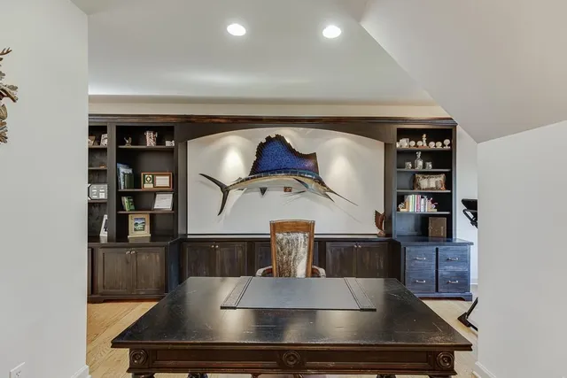 a bathroom with a sink vanity granite and toilet