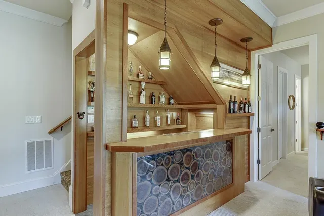 a view of a lake with a house in the background