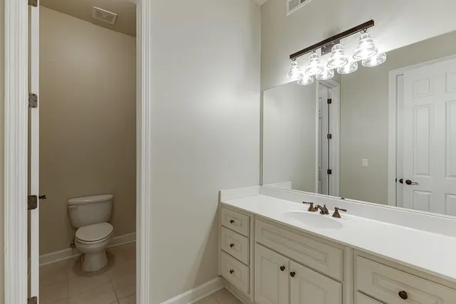 a view of a swimming pool with a yard