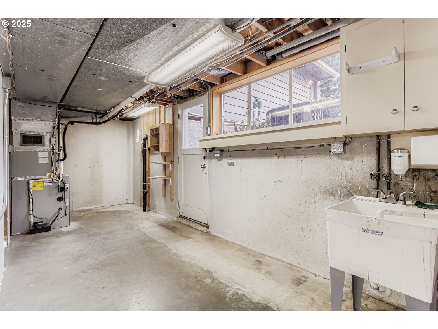 10832 Southeast Stephens Street Portland, OR 97216 - Photo 21 of 36 a view of a storage & utility room with a sink