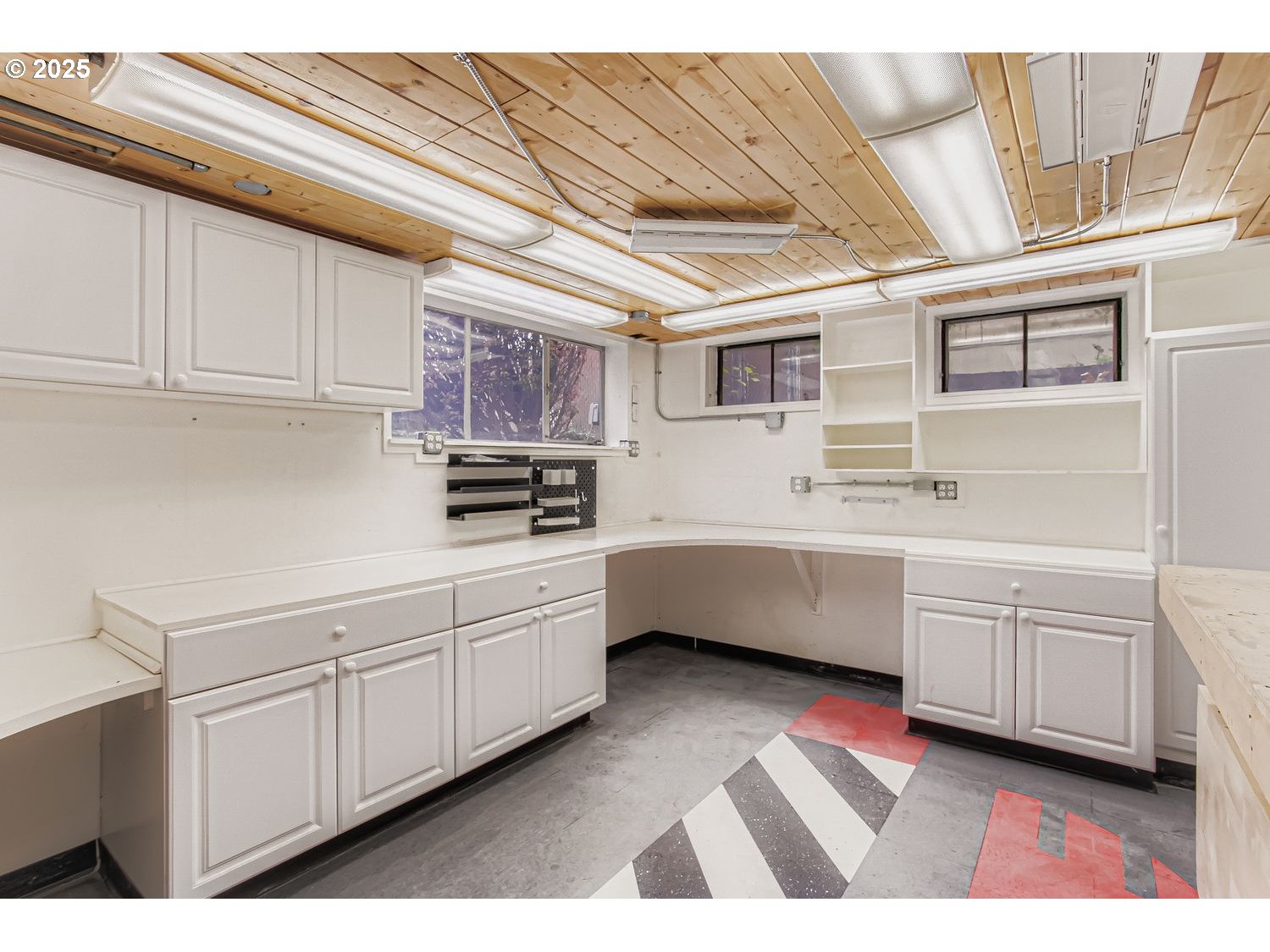 10832 Southeast Stephens Street Portland, OR 97216 - Photo 23 of 36 a kitchen with cabinets and window