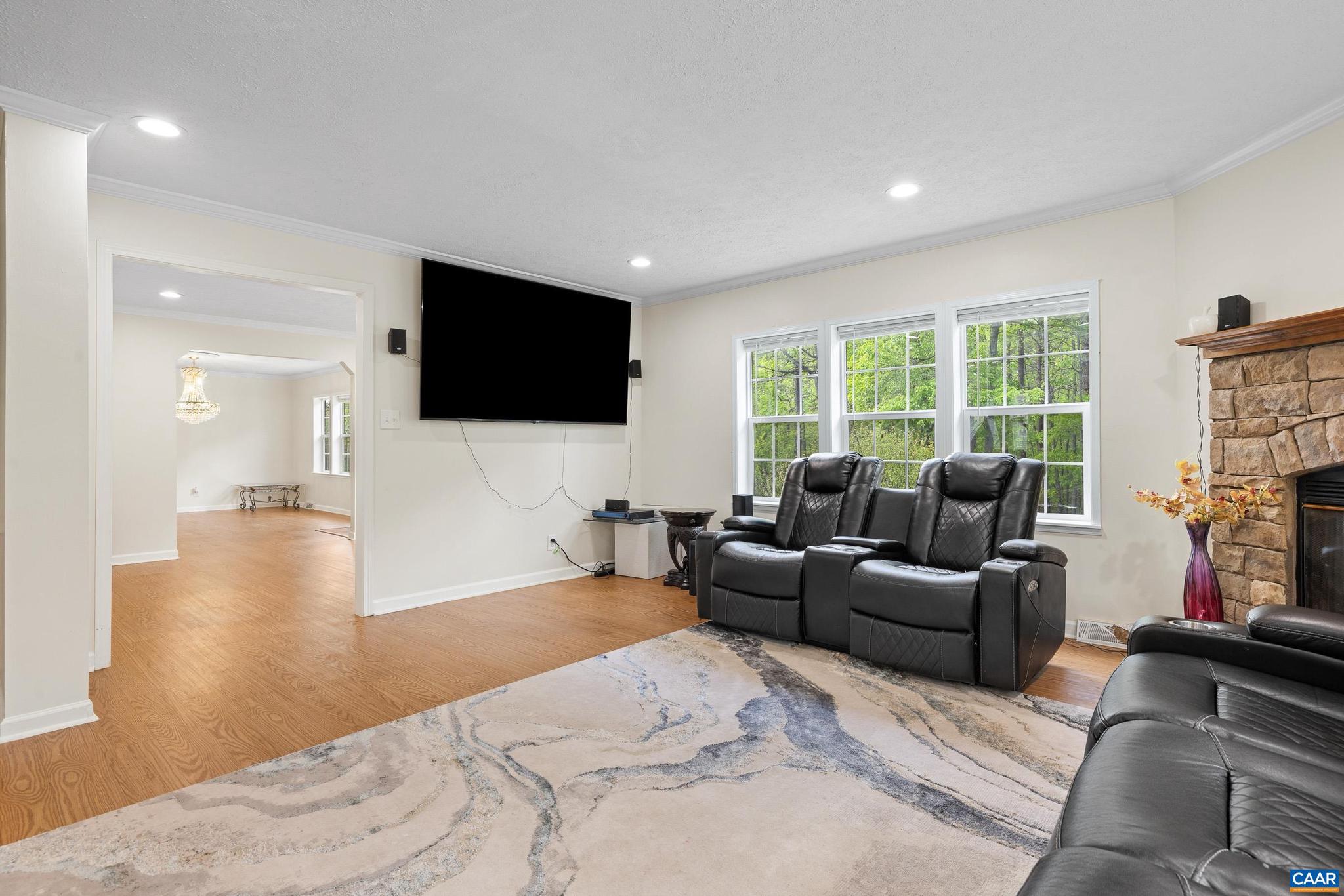 3151 Waldrop Church Road Louisa, VA 23093 - Photo 14 of 42 a living room with furniture and a flat screen tv