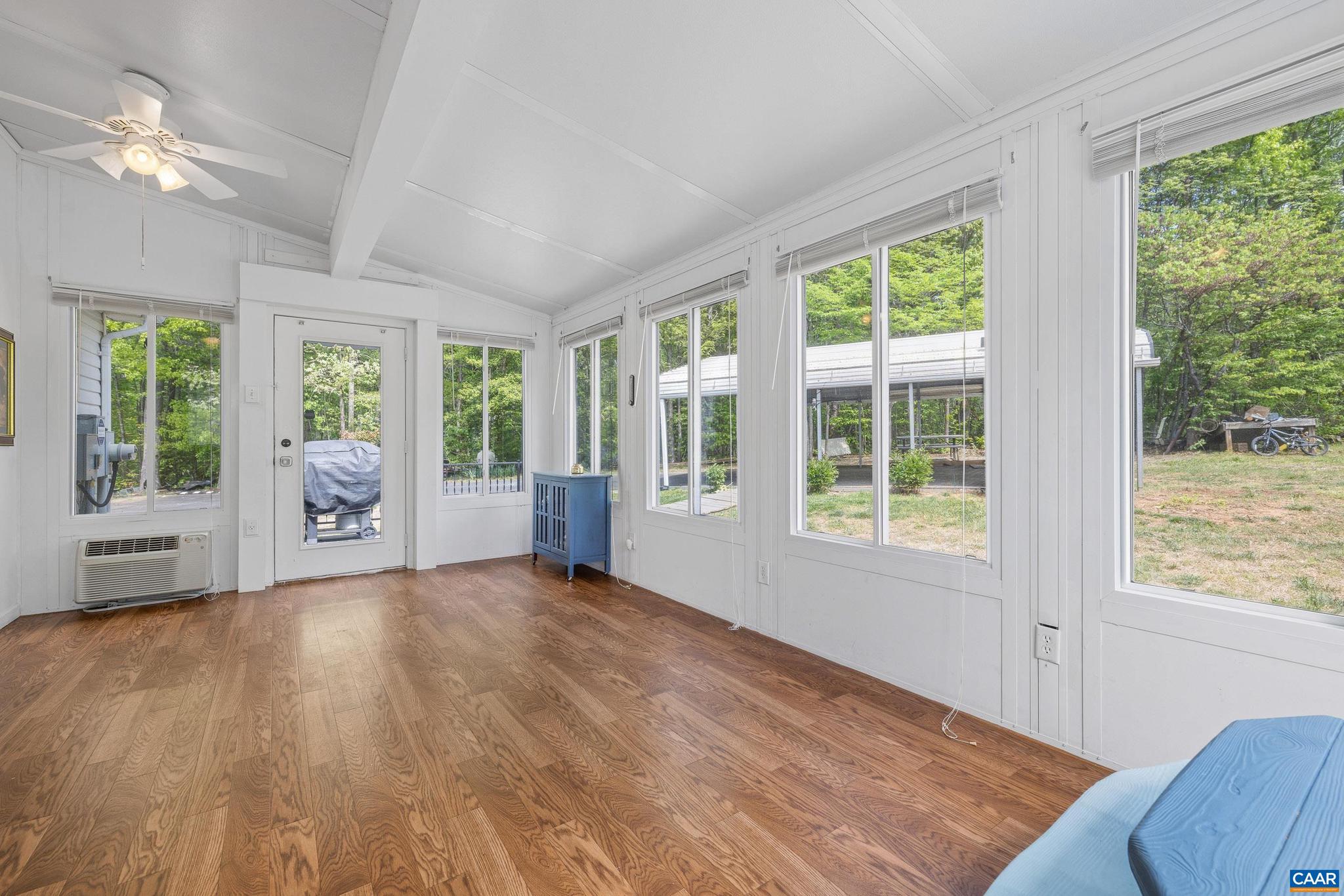 3151 Waldrop Church Road Louisa, VA 23093 - Photo 20 of 42 a view of an empty room with a window and wooden floor