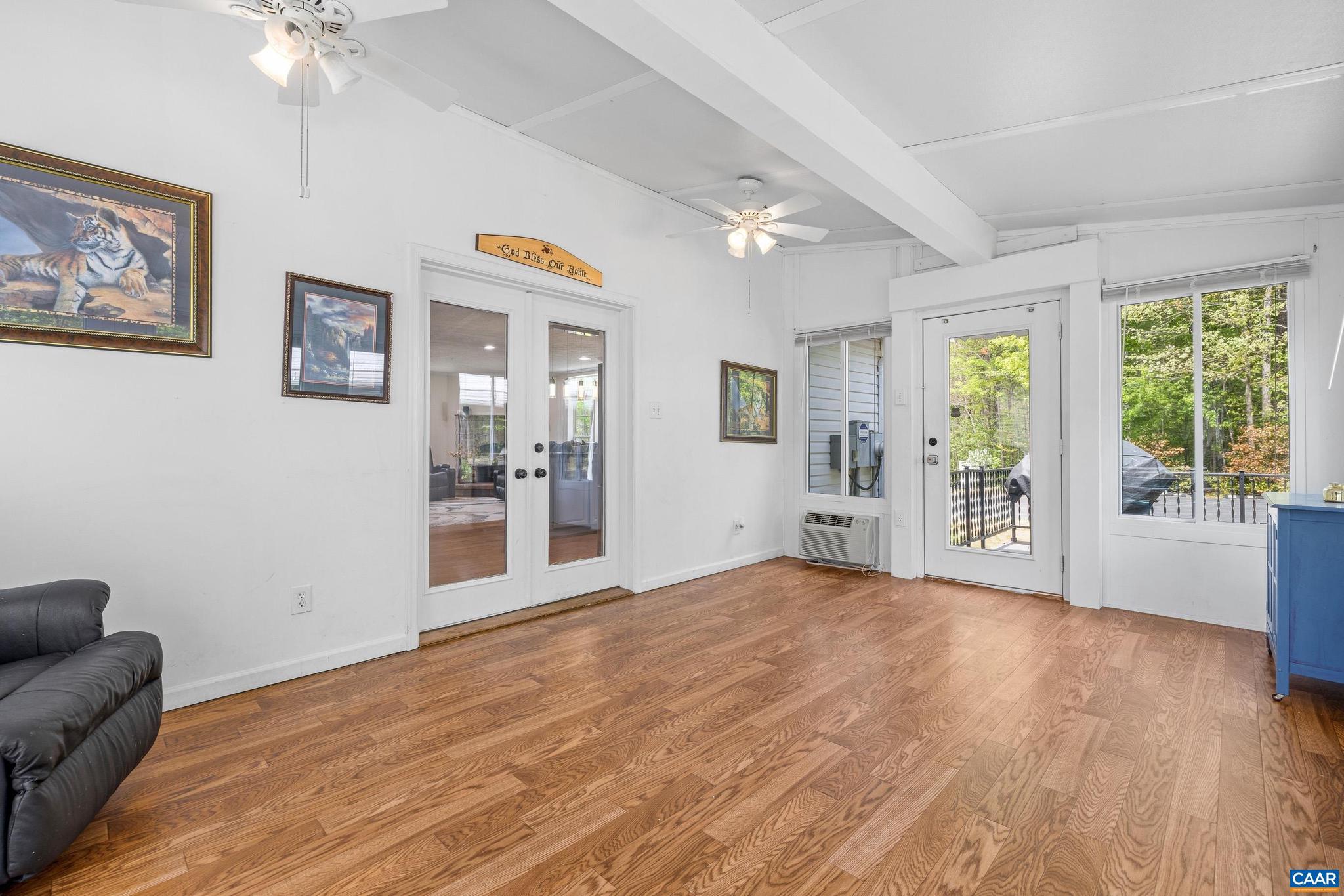 3151 Waldrop Church Road Louisa, VA 23093 - Photo 21 of 42 a view of an empty room with window and wooden floor
