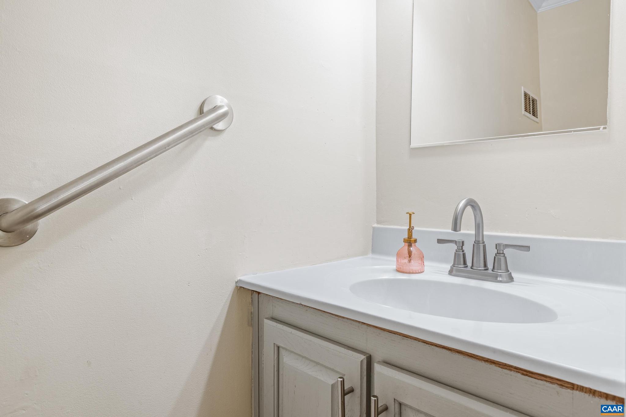 3151 Waldrop Church Road Louisa, VA 23093 - Photo 22 of 42 a bathroom with a sink and a mirror