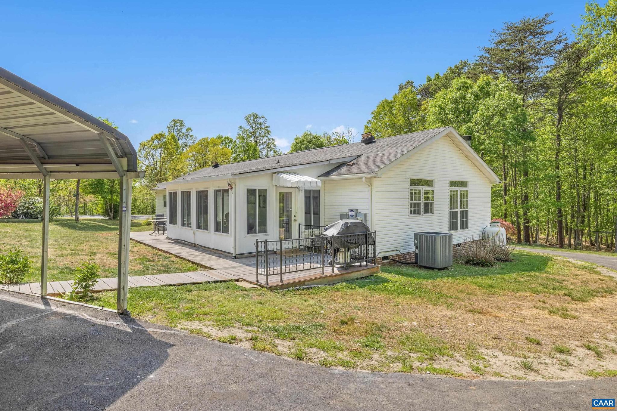 3151 Waldrop Church Road Louisa, VA 23093 - Photo 34 of 42 a view of a house with backyard and sitting area