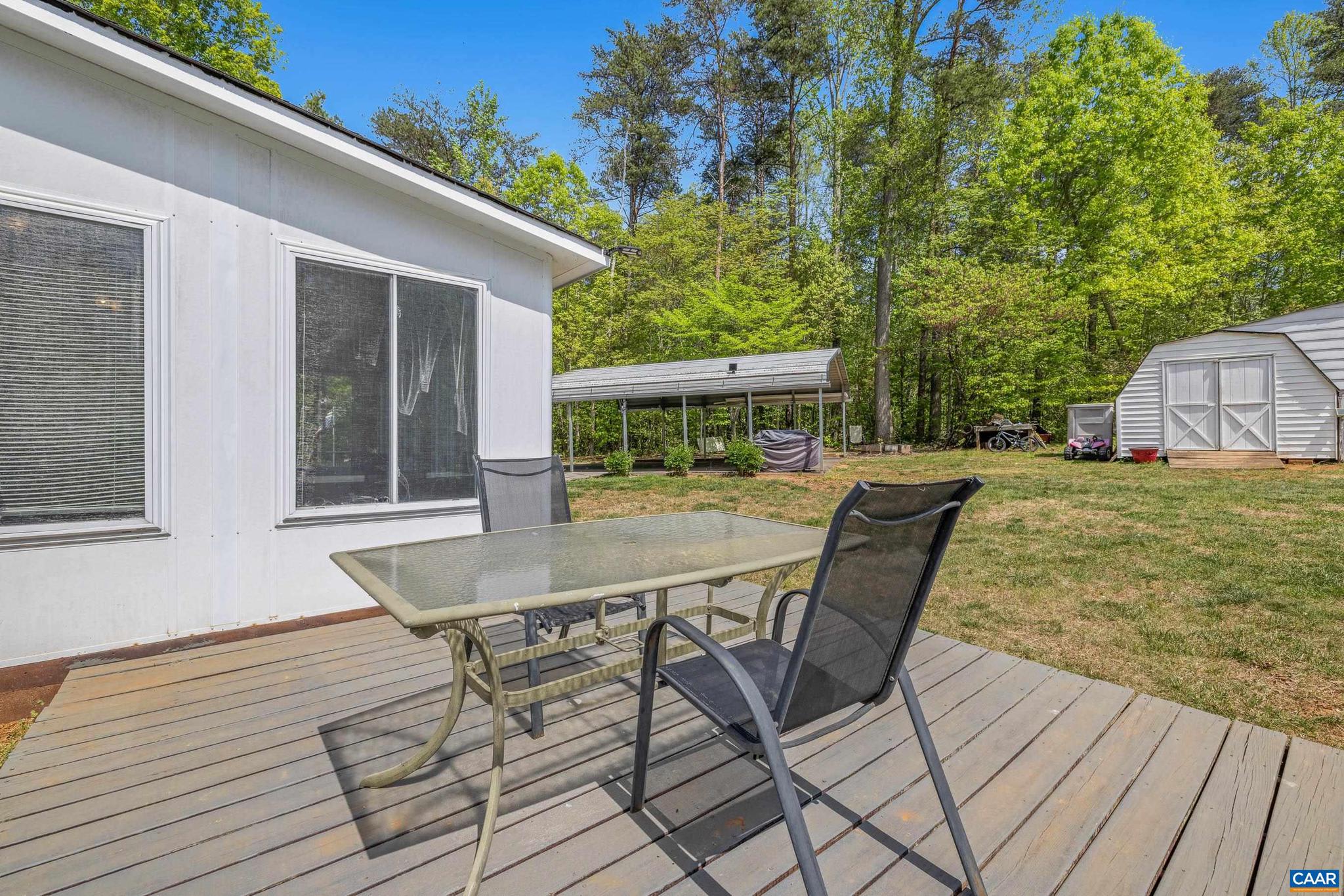 3151 Waldrop Church Road Louisa, VA 23093 - Photo 35 of 42 a view of a house with backyard and sitting area