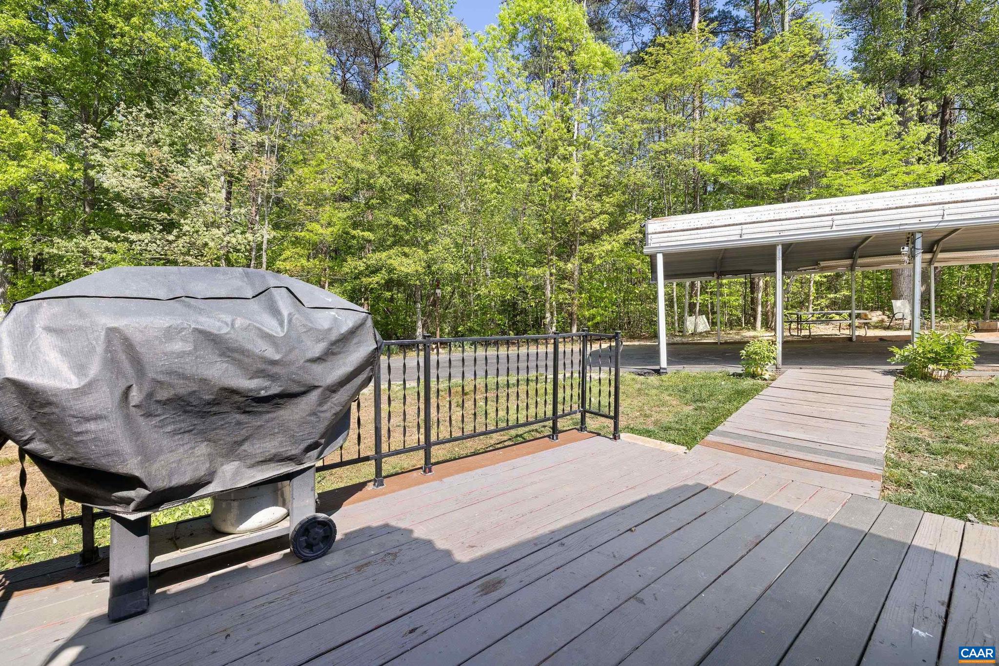 3151 Waldrop Church Road Louisa, VA 23093 - Photo 36 of 42 a view of a wooden deck and a backyard
