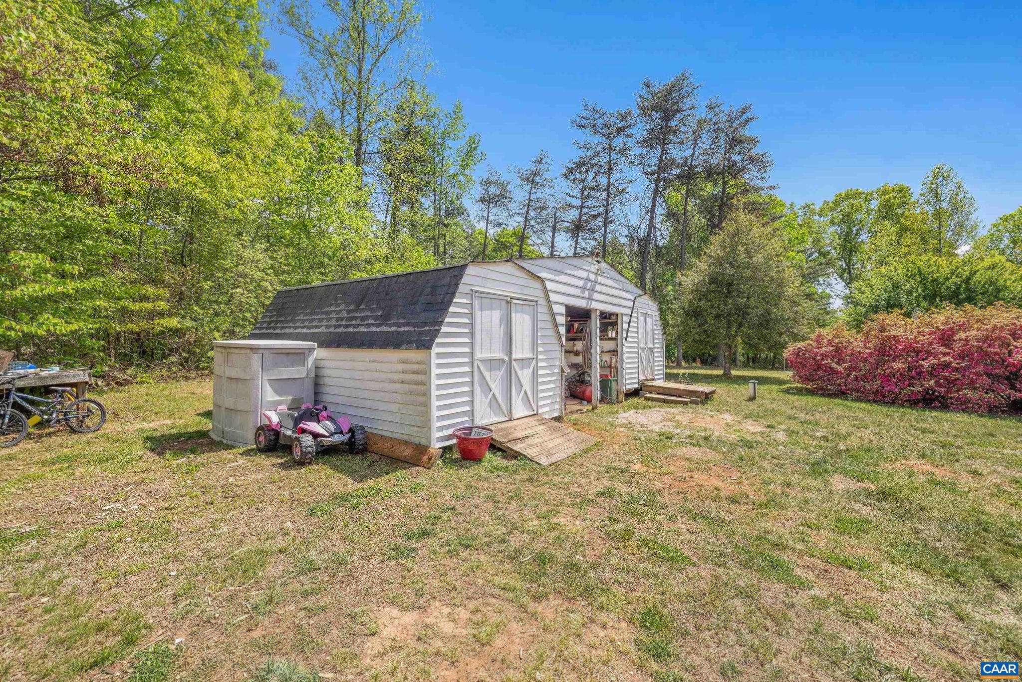 3151 Waldrop Church Road Louisa, VA 23093 - Photo 40 of 42 a view of a house with a yard