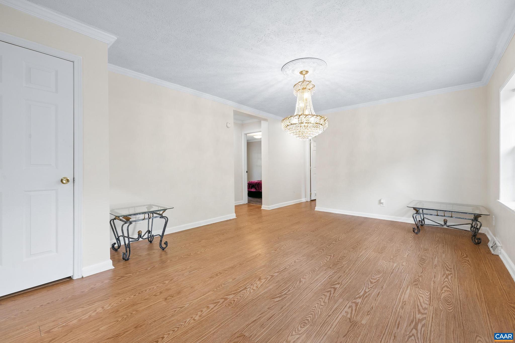 3151 Waldrop Church Road Louisa, VA 23093 - Photo 7 of 42 a view of a room with a chandelier and wooden floor