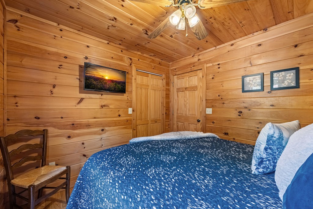 196 Ethan Wilson Way Morganton, GA 30560 - Photo 54 of 66 a bedroom with a bed and furniture